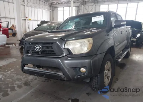 2015 Toyota Tacoma Base V6 z USA, uszkodzony, nr VIN 5TFLU4EN4FX118128